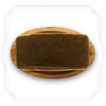 Load image into Gallery viewer, Static Mango CBD hash close up in wooden bowl on white background
