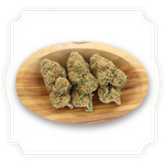 Load image into Gallery viewer, Photo of Blueberry Octane CBD hemp tea flower in wooden bowl
