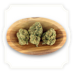 Load image into Gallery viewer, Fruit of the Gods CBD flower in wooden bowl
