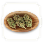 Load image into Gallery viewer, Sour Diesel CBD Hemp Flower in wooden bowl
